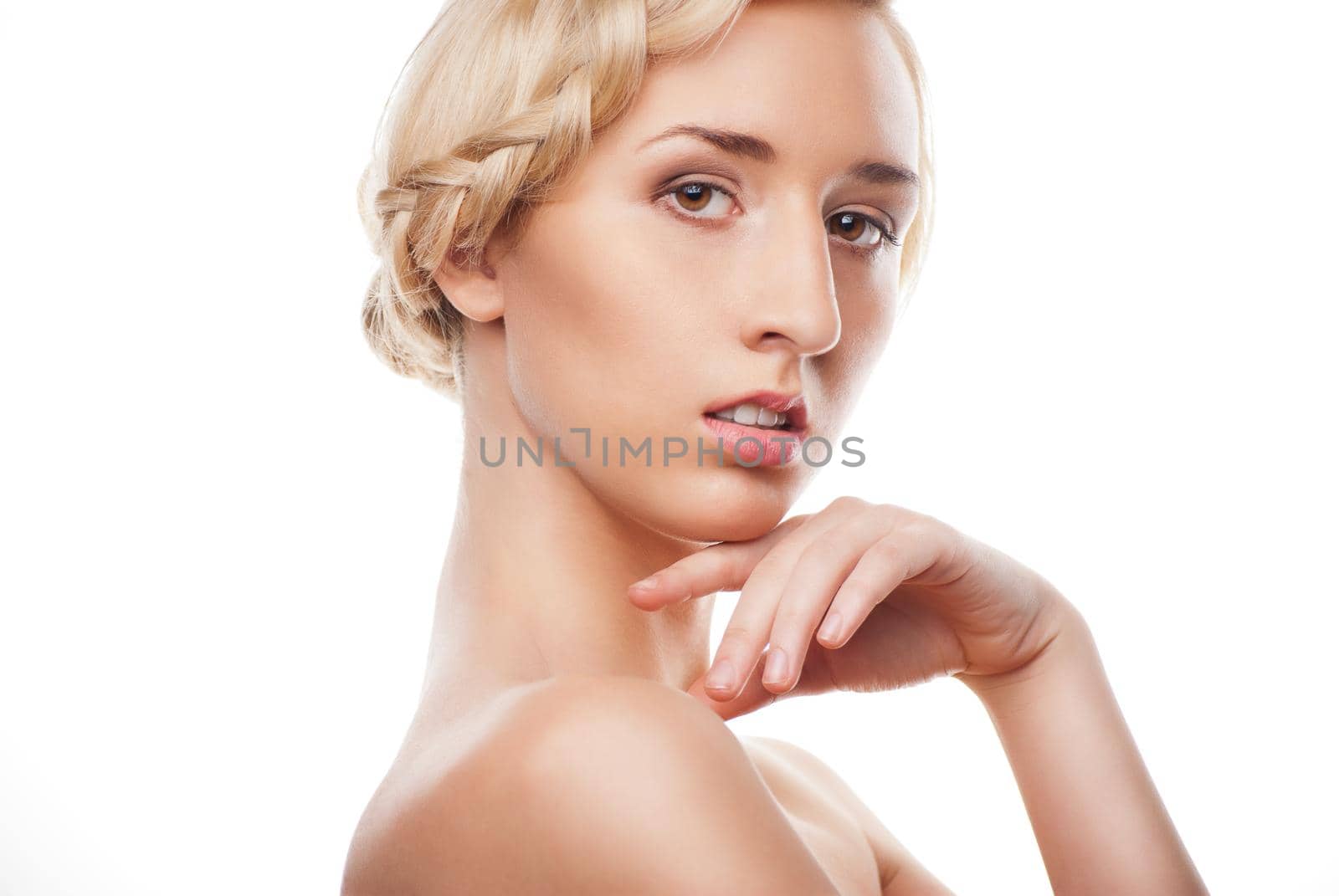 Beautiful blond woman with fashion hairstyle with element of pigtail- on a white