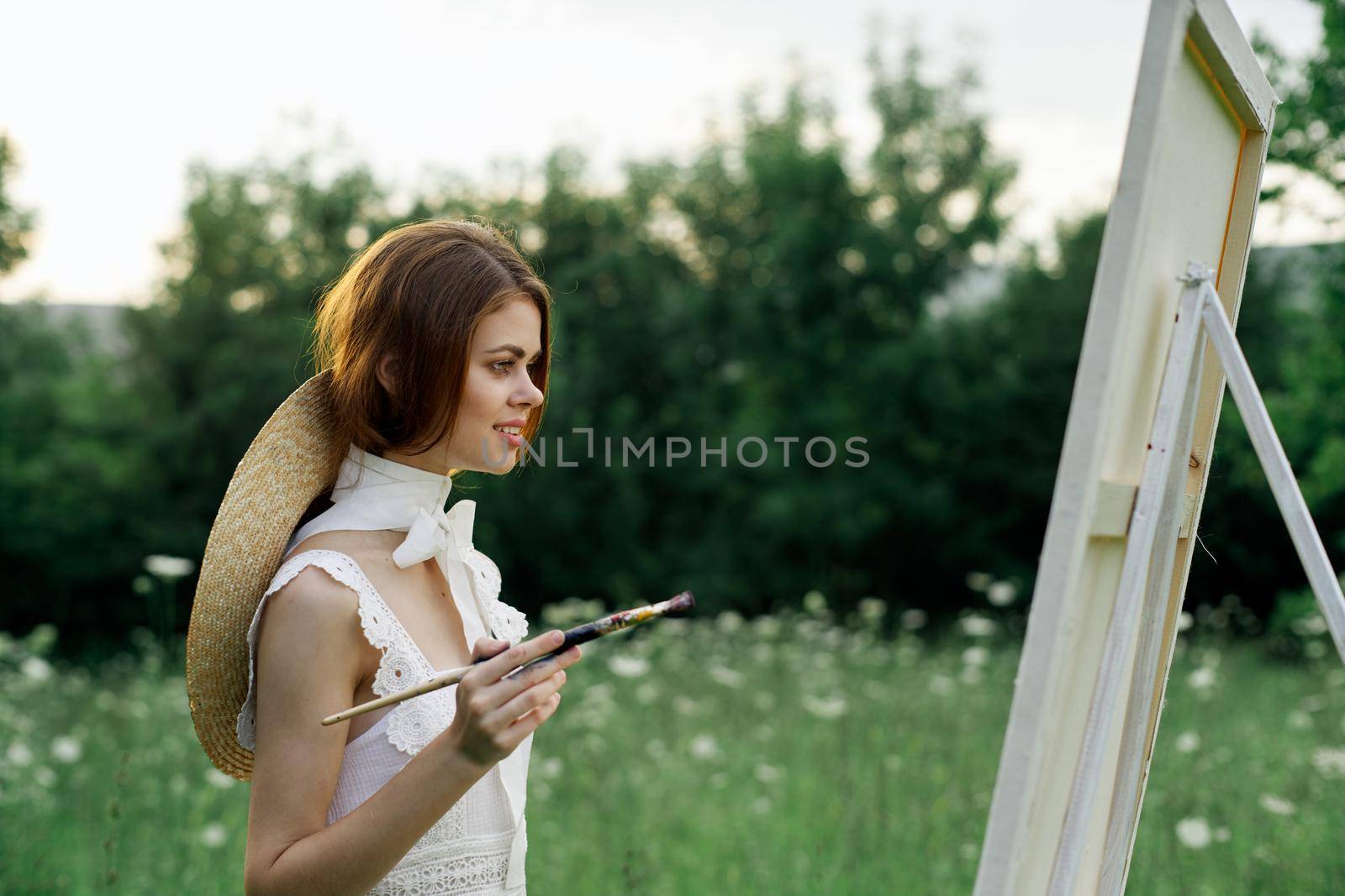 woman artist outdoors painting nature hobby art by Vichizh