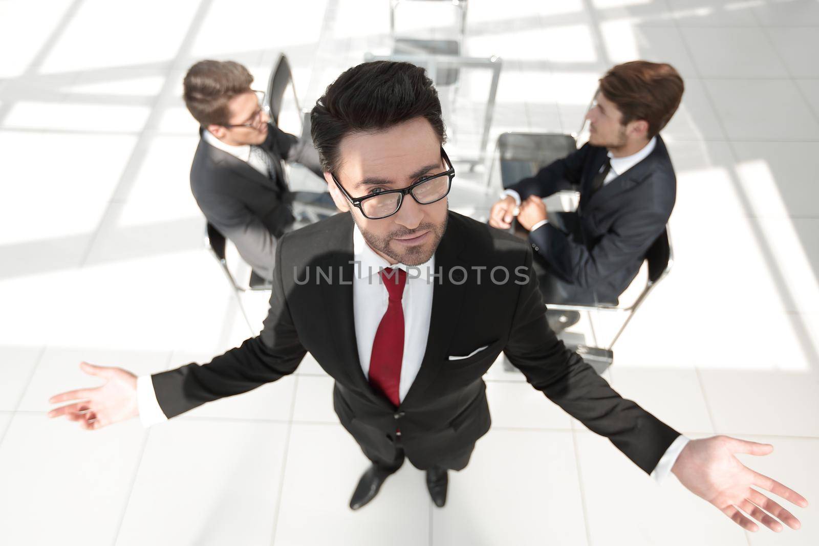 responsible businessman in the background of the office.business concept