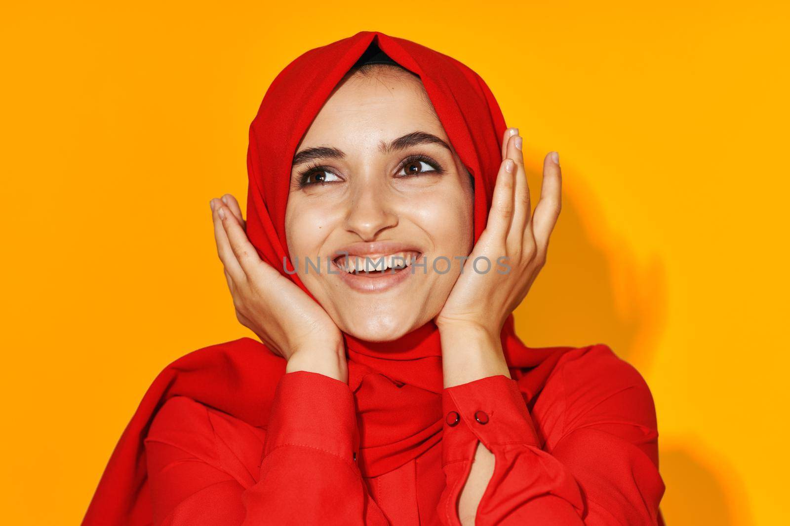 pretty woman posing smile fashion yellow background. High quality photo