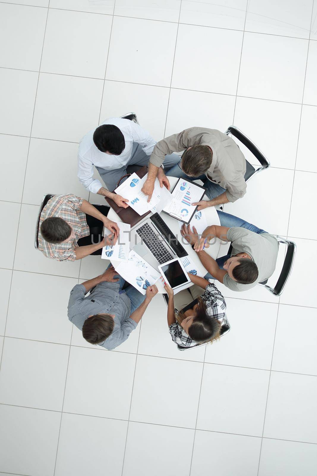 top view.business team discussing financial documents by asdf