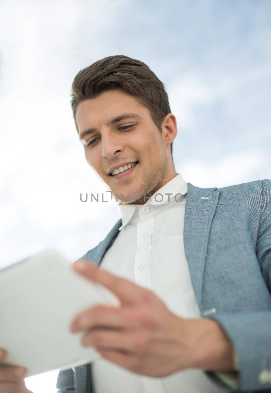 close up.businessman with digital tablet.people and technology