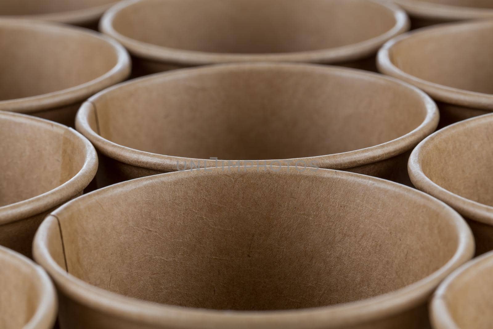 Empty disposable paper coffee cups for background