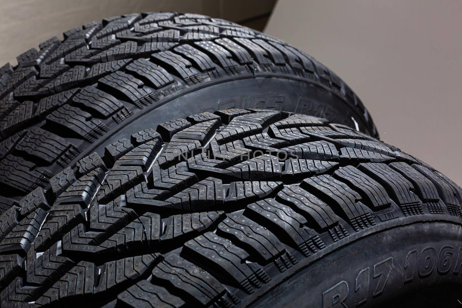 two black tires on the gray background