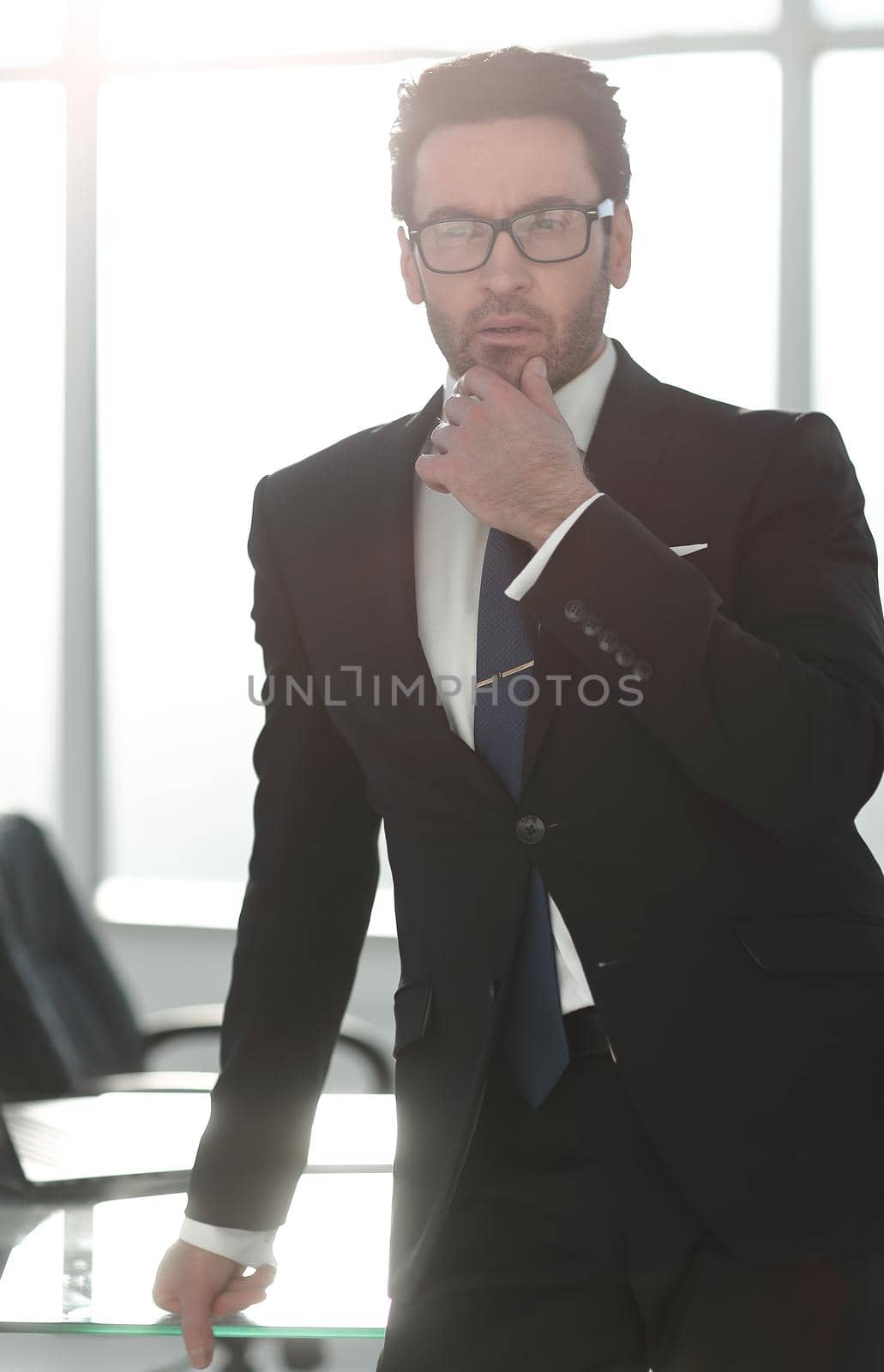 close up.confident businessman standing in the office.business people