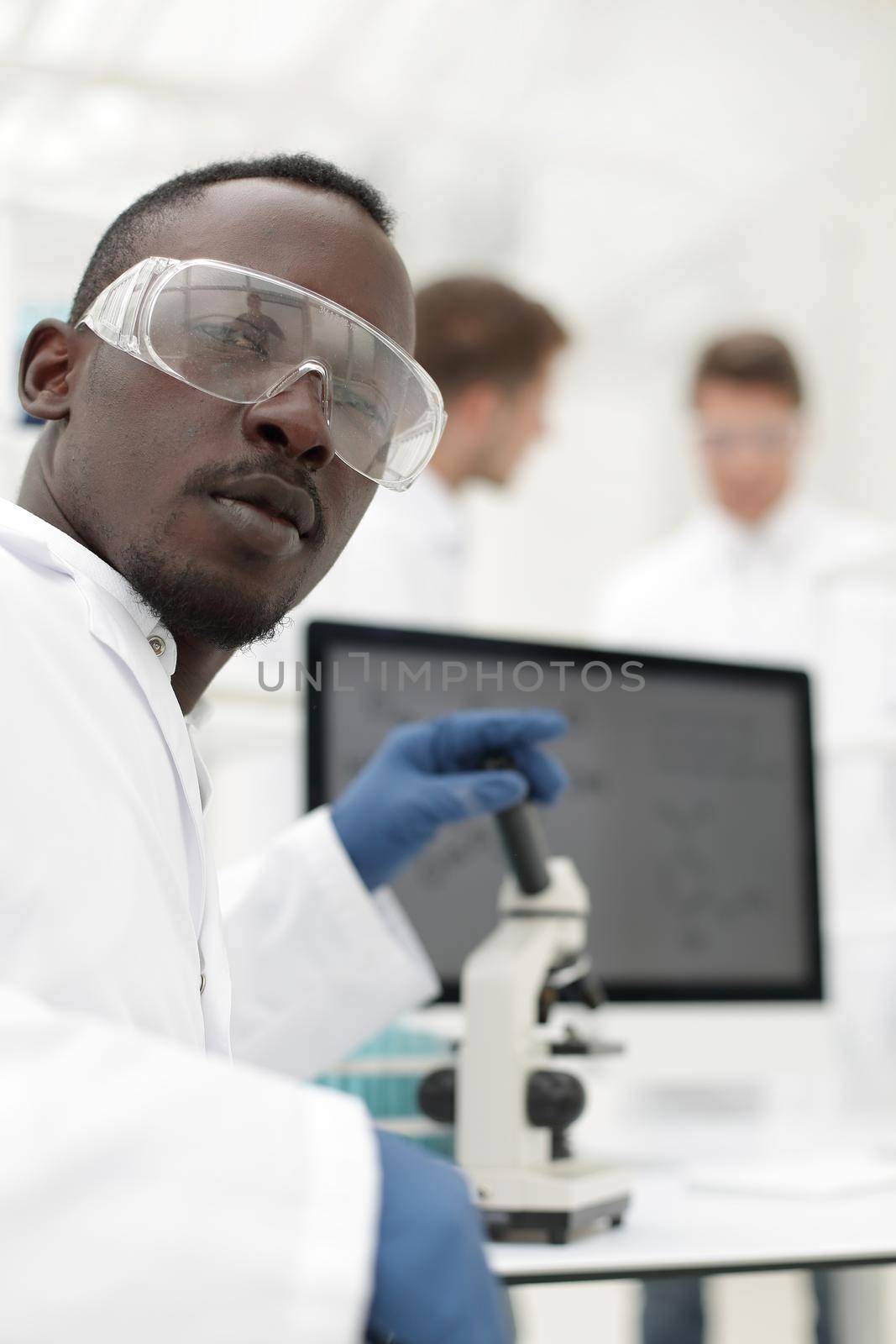 close up.modern scientist in the laboratory by asdf