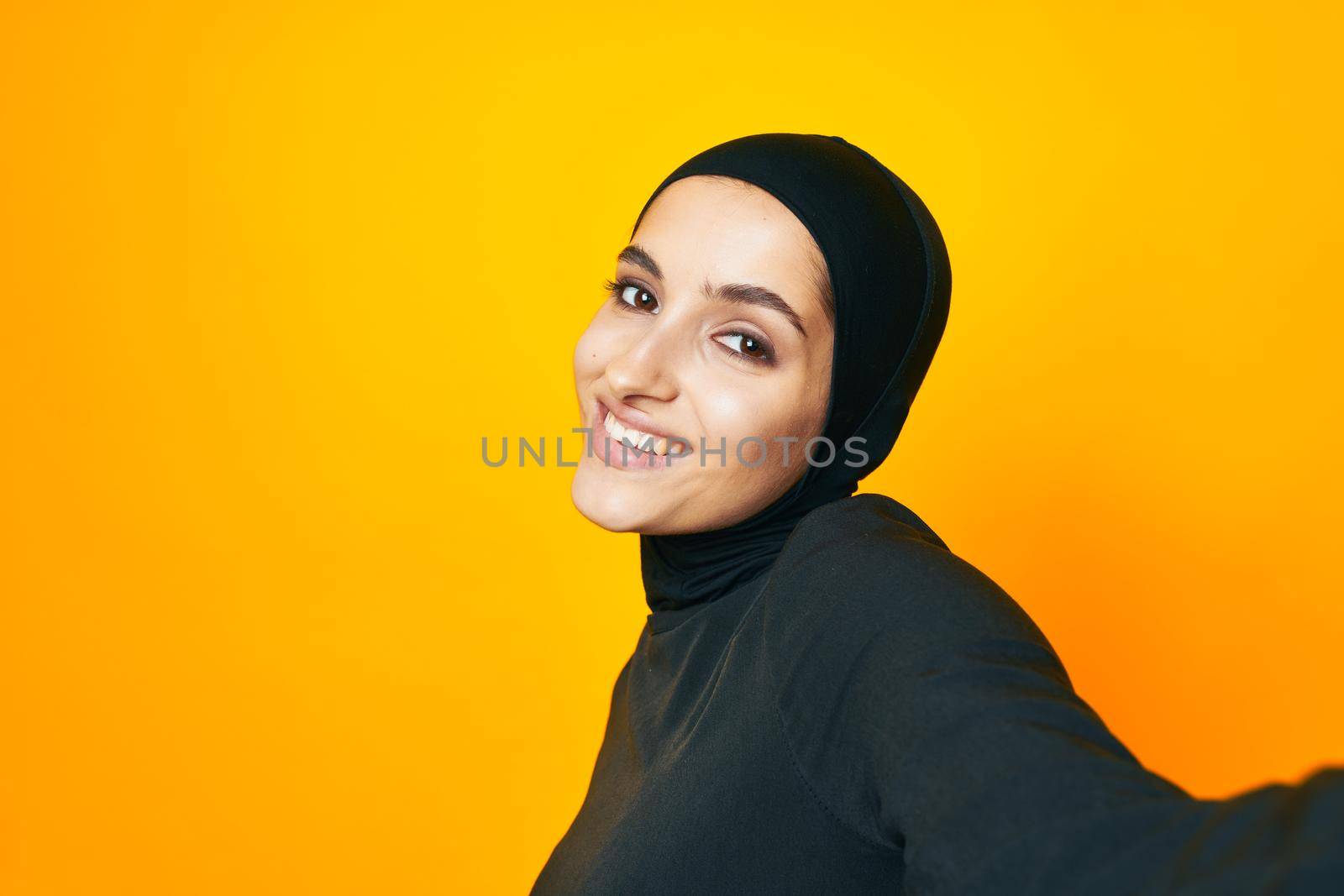 Muslim happiness fashion clothing hand gesture isolated background. High quality photo