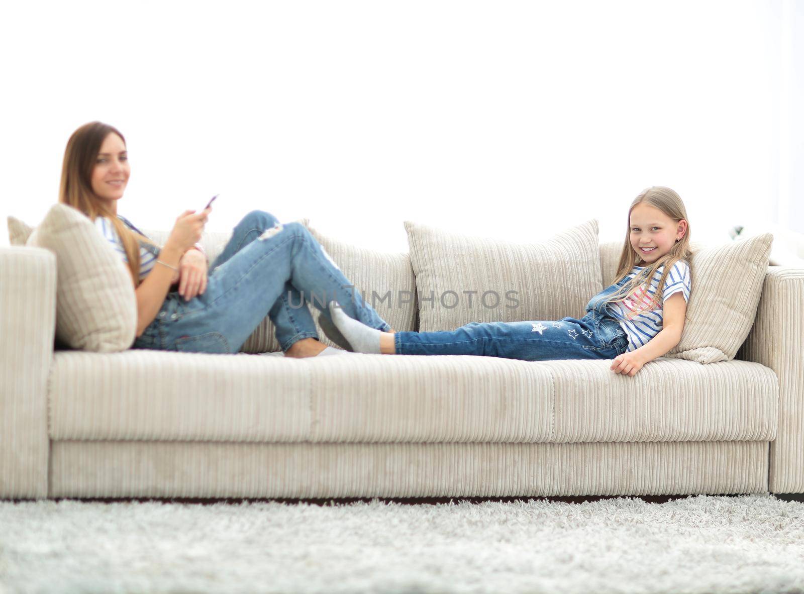 little girl jumping on the couch on the couch in the living room by asdf