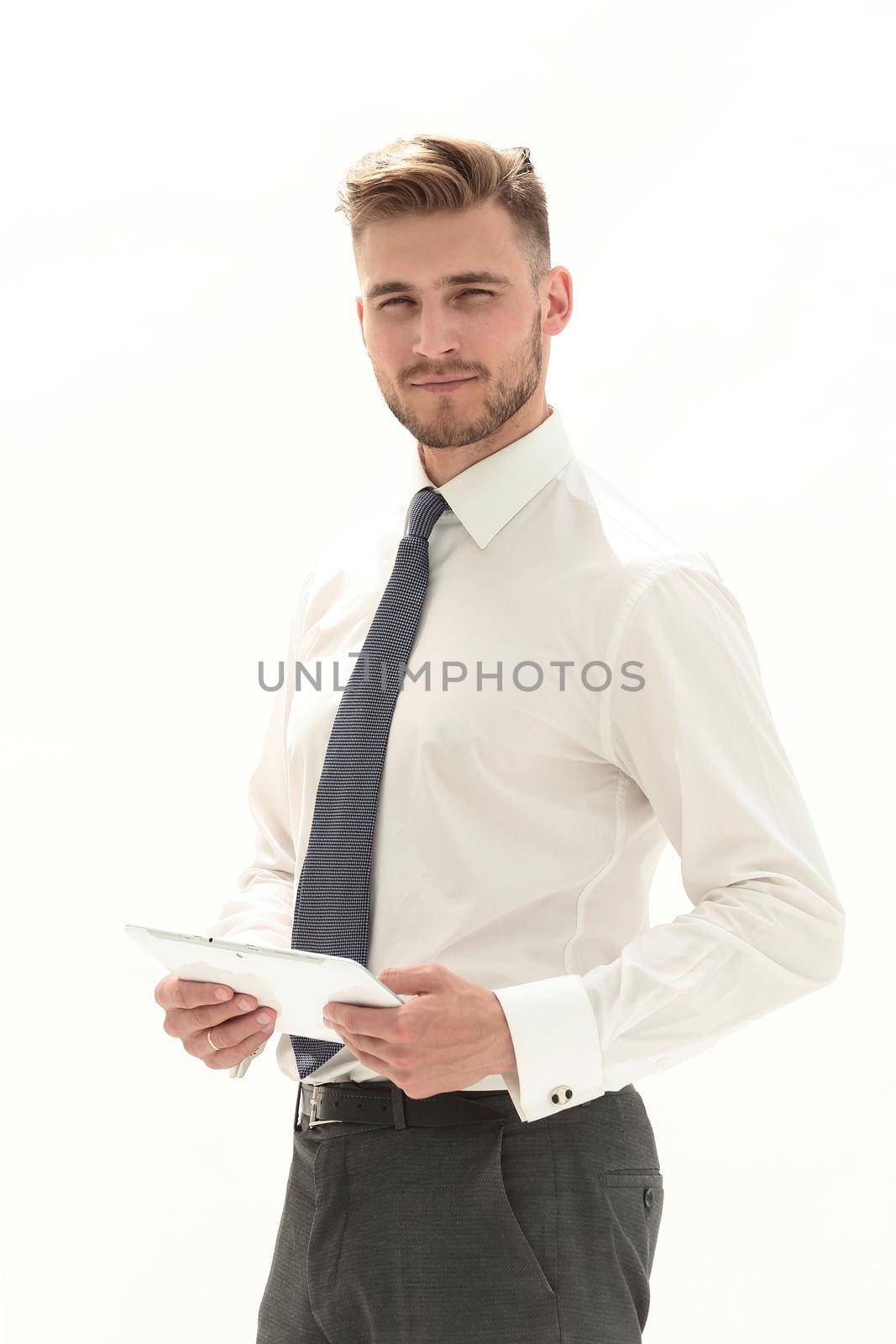 close up.smiling businessman with digital tablet.isolated on white background