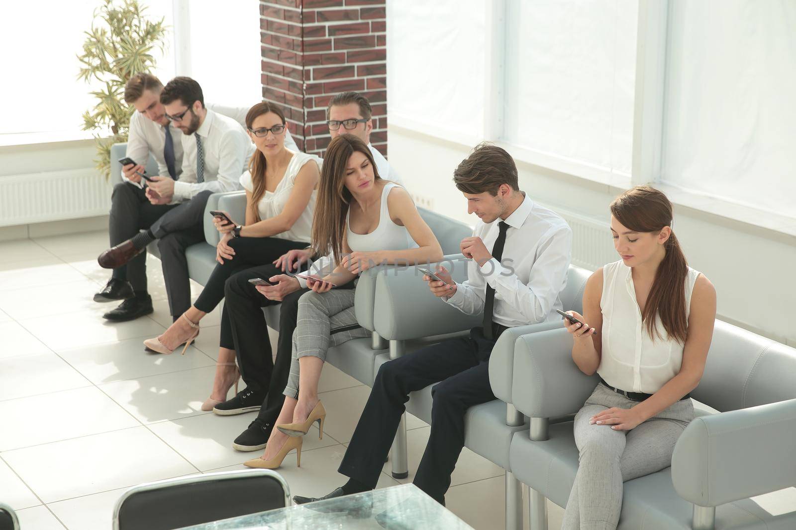 group of young people waiting for an interview.people and technology