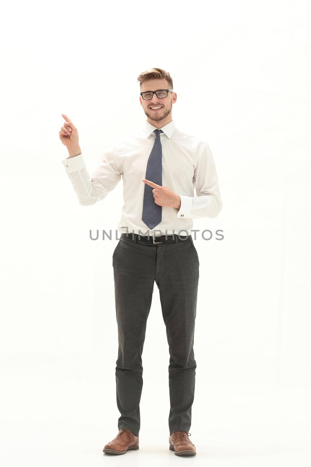 Smiling businessman pointing fingers at white space.photo with text space