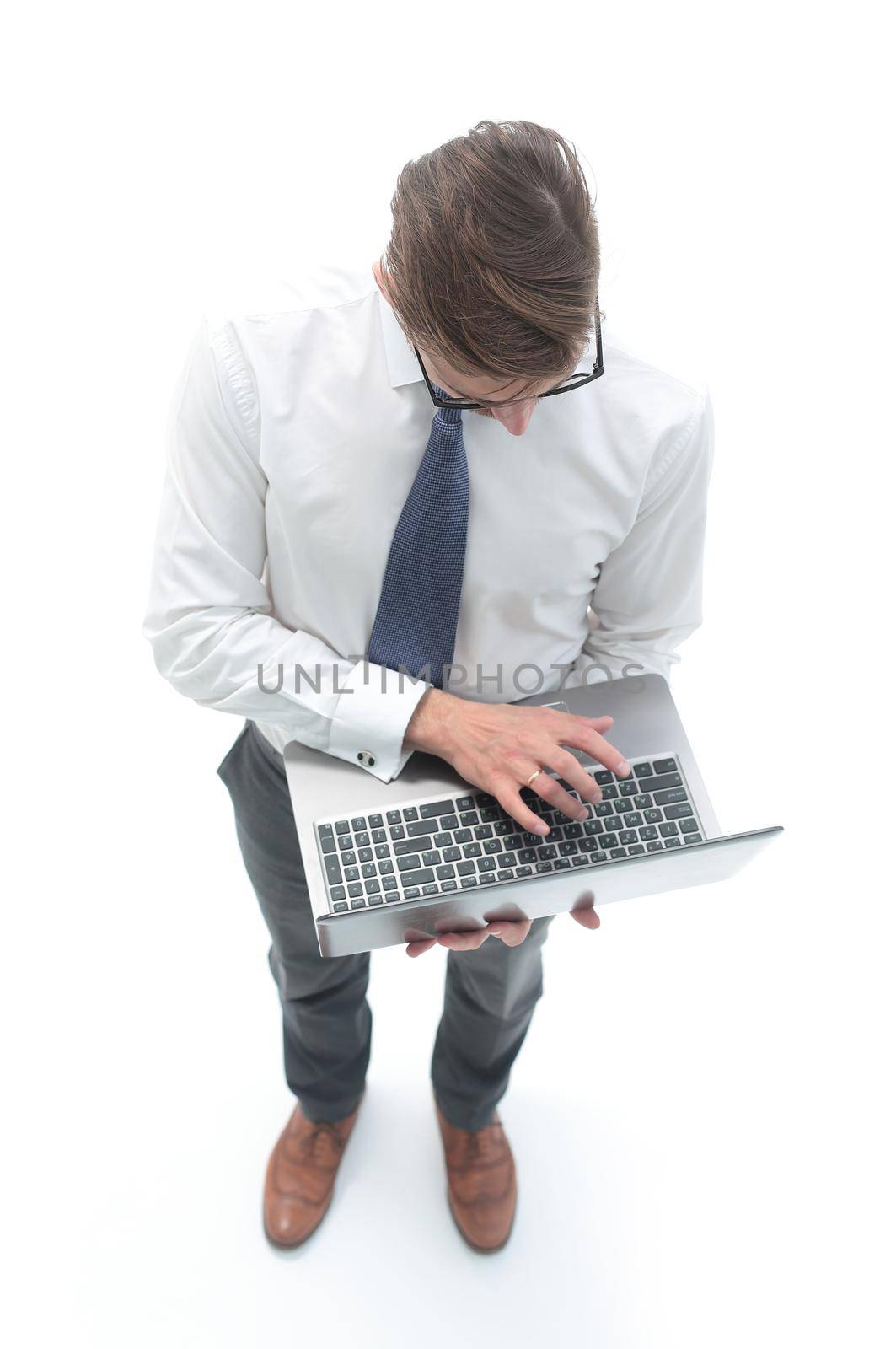 top view. businessman typing on laptop keyboard by asdf