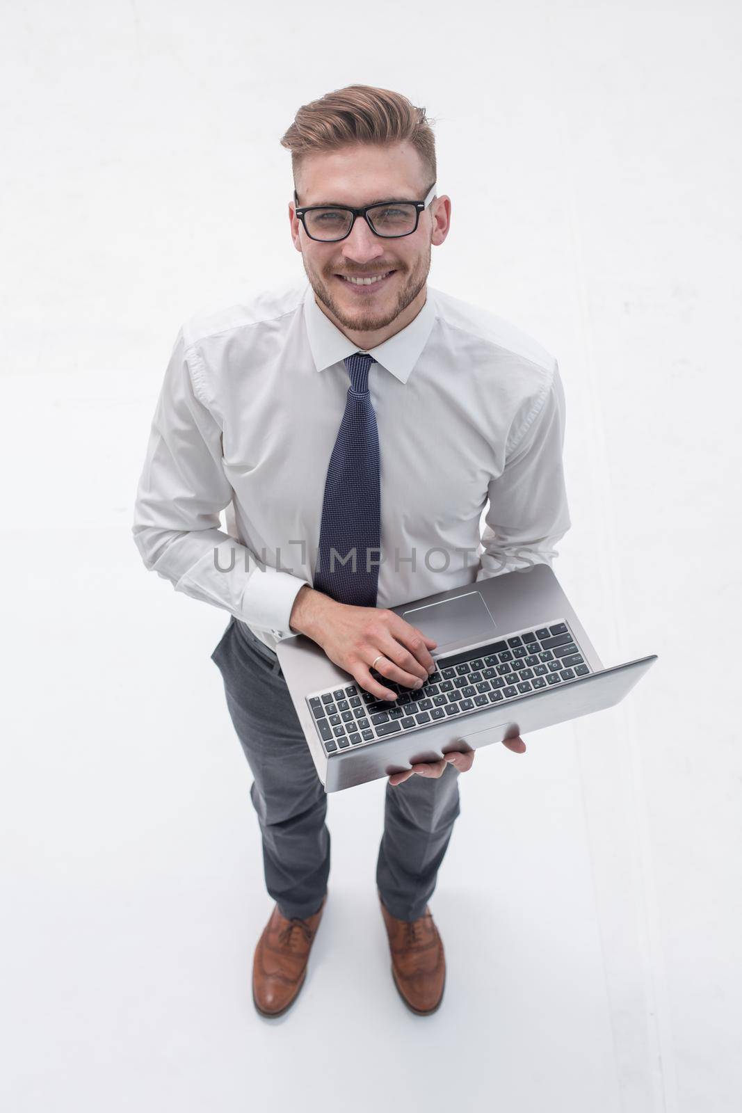 top view. businessman typing on laptop keyboard.people and technology