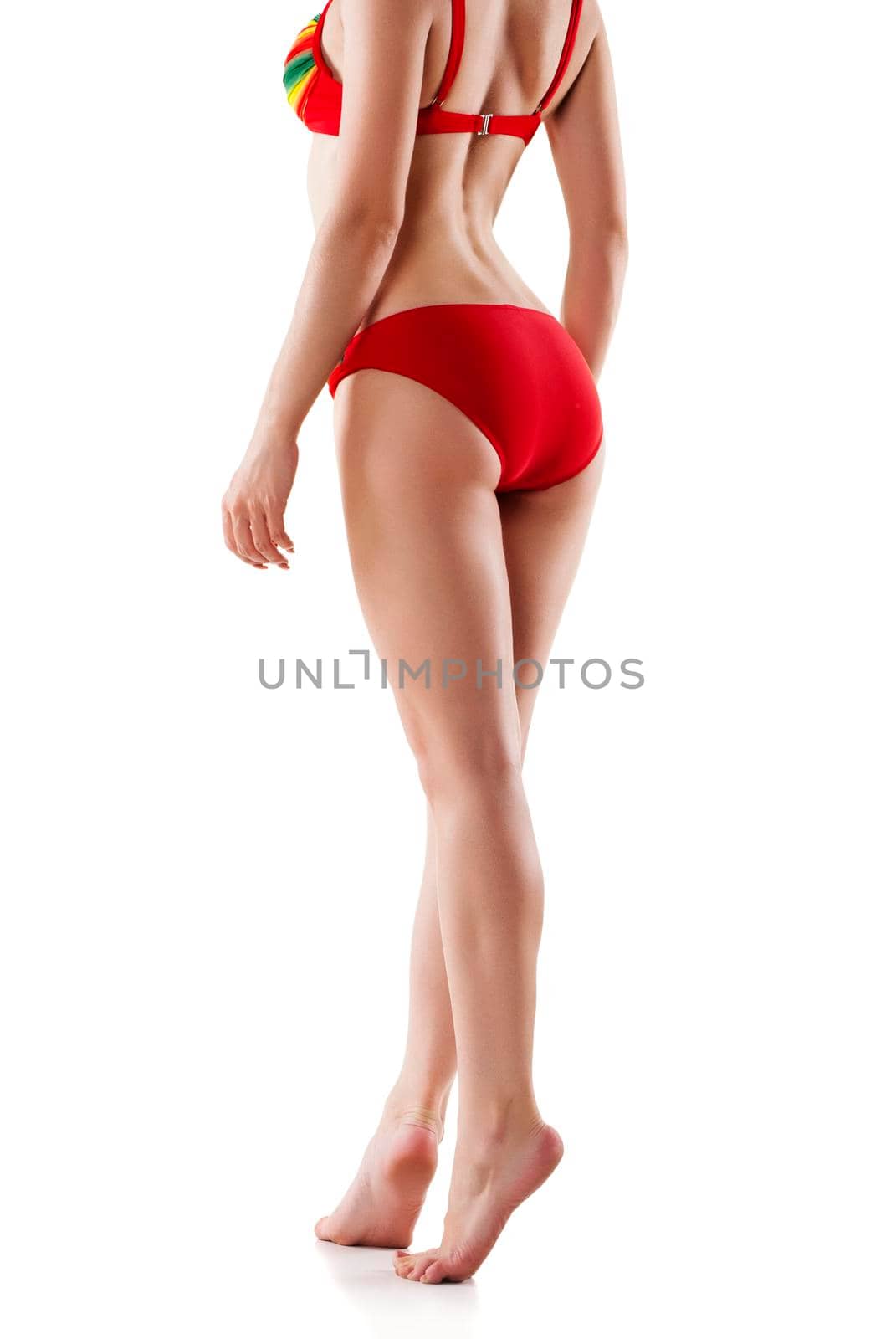 Rear view of beautiful caucasian woman with long legs, isolated on white background