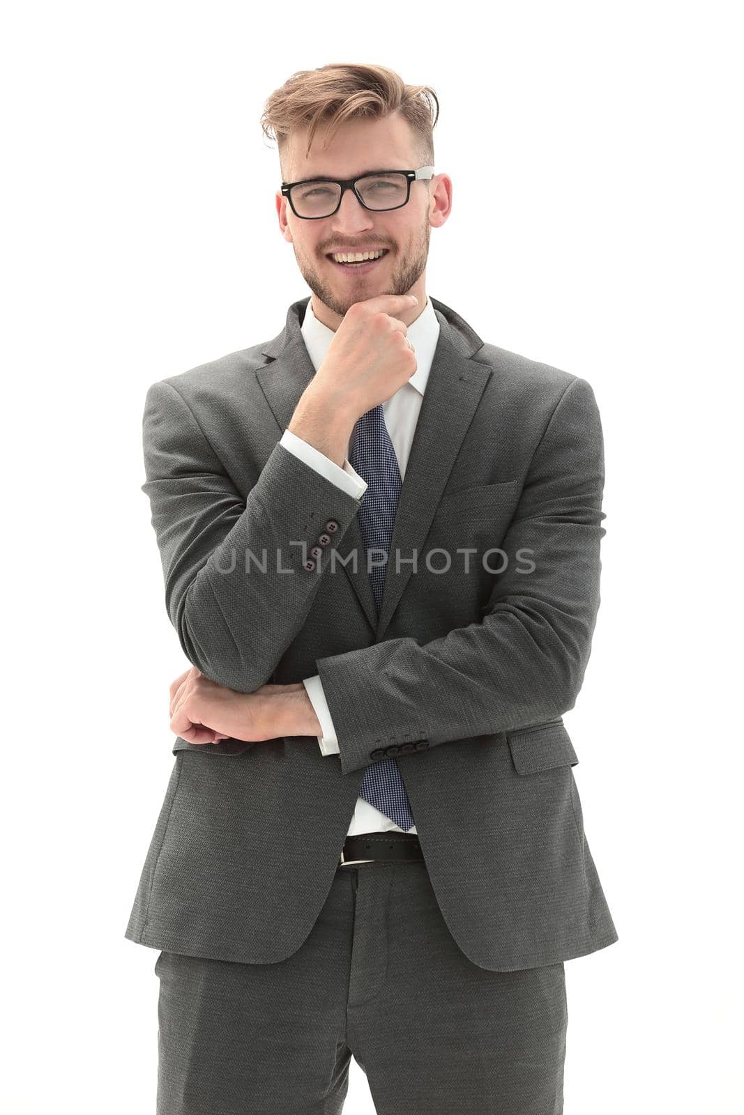 in full growth.portrait of a young thoughtful businessman.isolated on white background