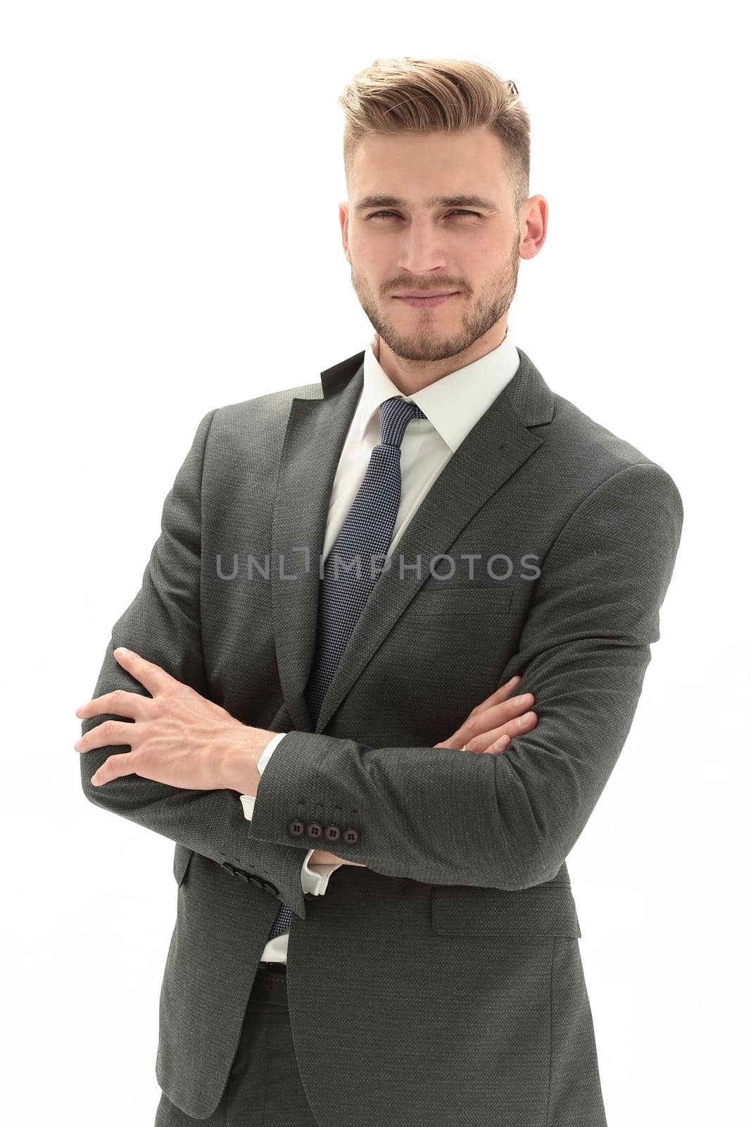 close up.portrait of a confident young businessman.isolated on white