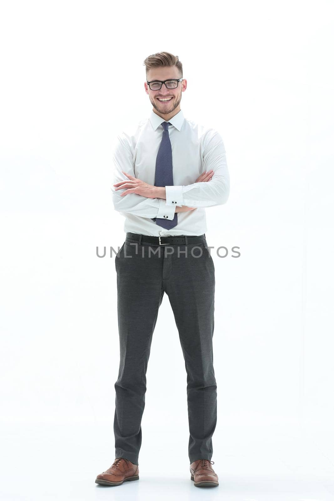 in full growth. confident business man.isolated on white background.