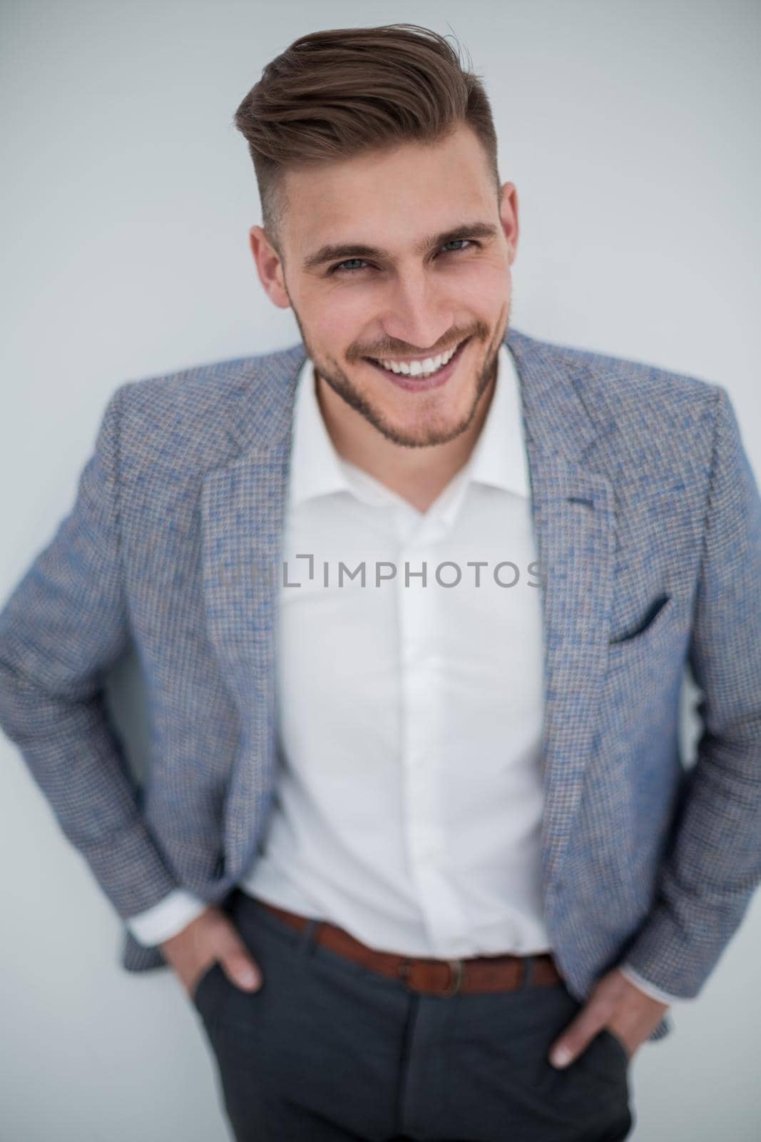 portrait of smiling businessman.isolated on light background
