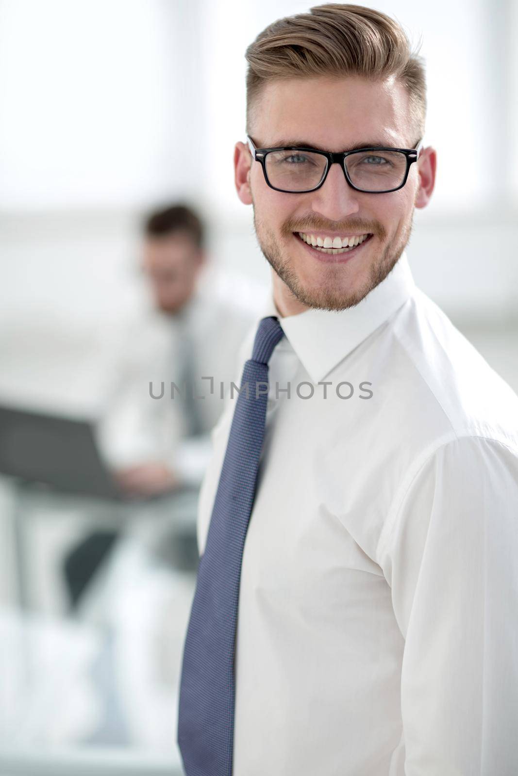 close up.successful businessman on the background of the office by asdf