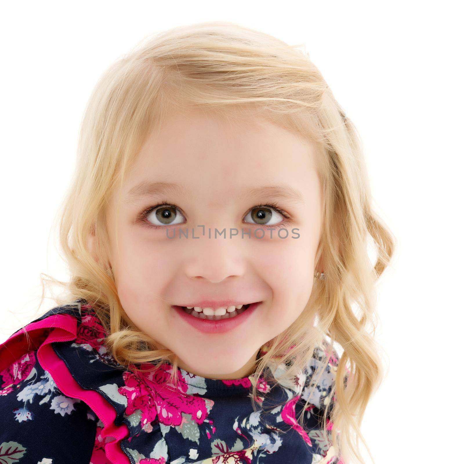 Beautiful little girl close-up. The concept of beauty and fashion, happy childhood. Isolated on white background.