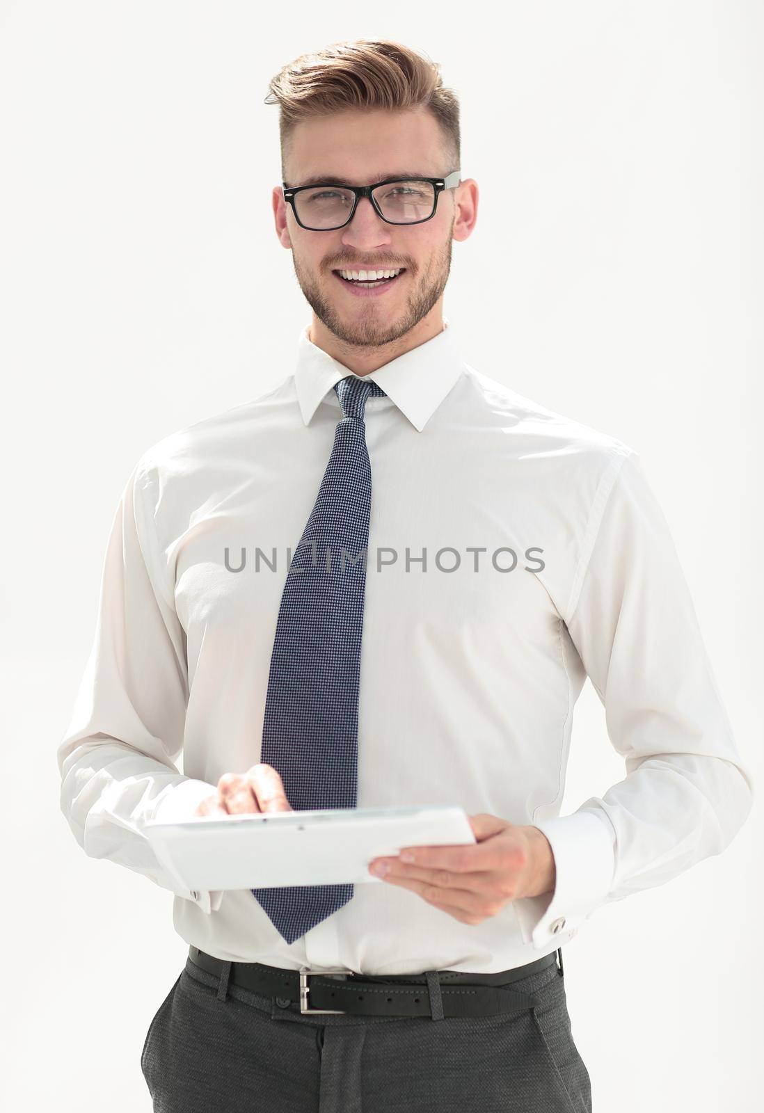 close up. smiling businessman with digital tablet. people and technology