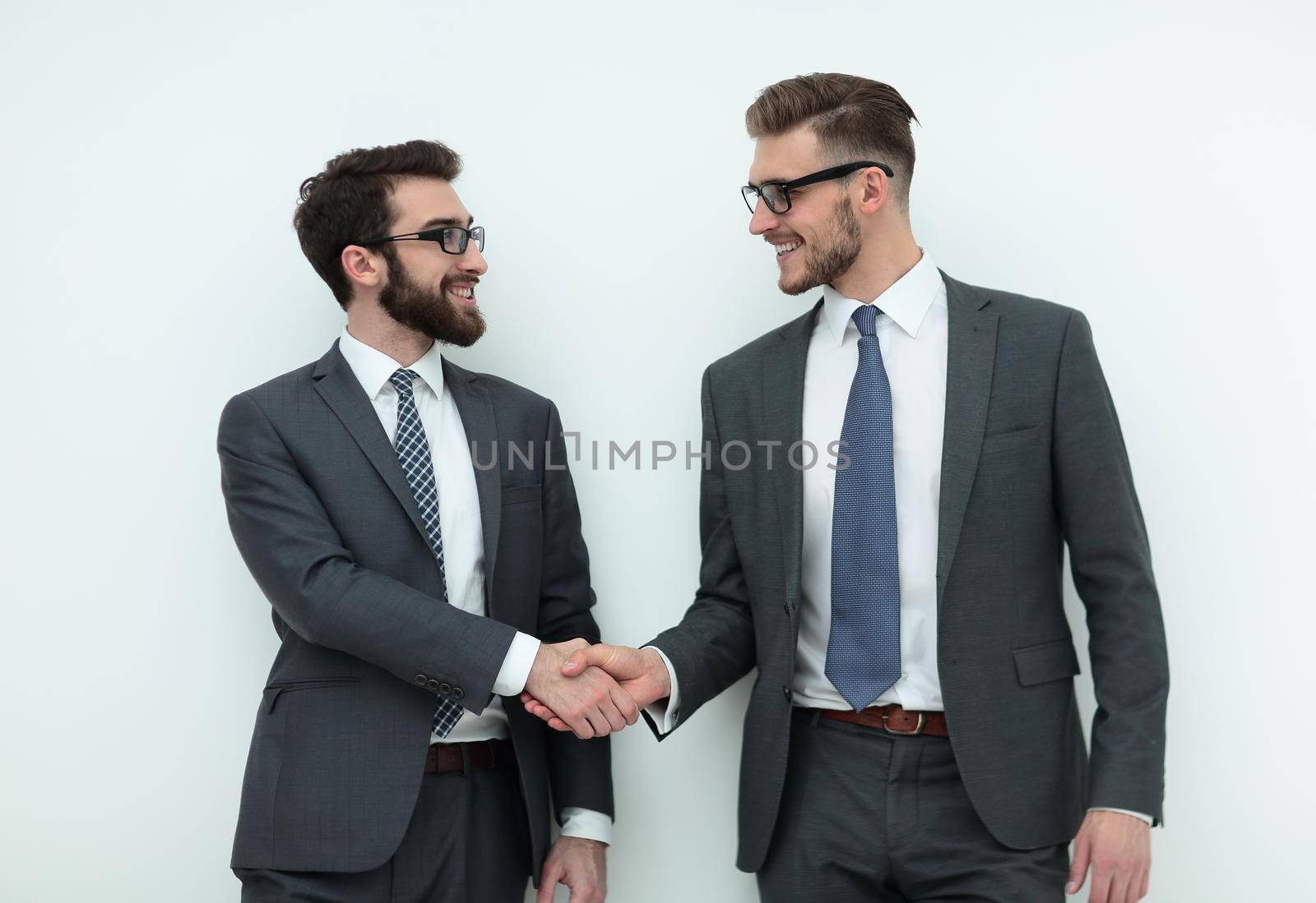 handshake of two business people.isolated on light background