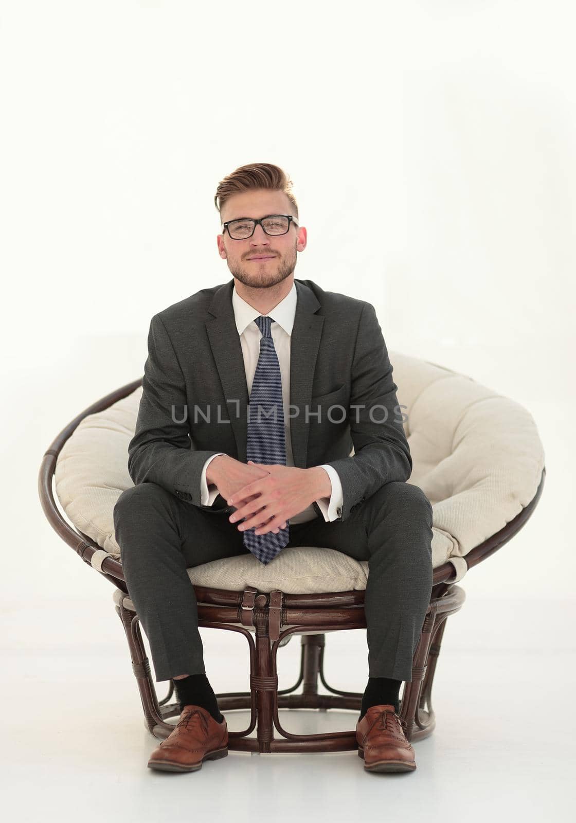 close up.successful businessman sitting in a comfortable chair.business people