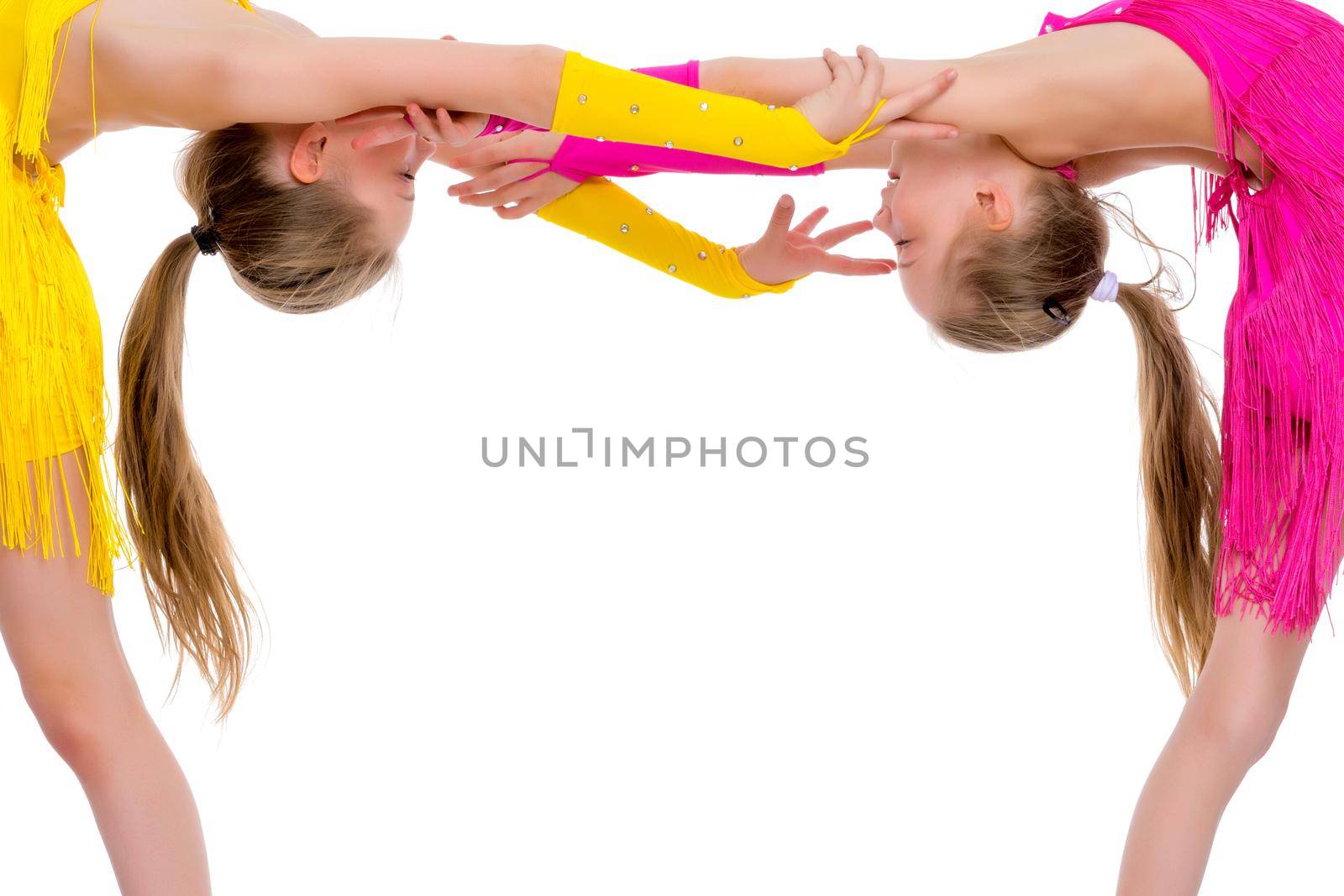 Girls gymnasts perform exercises. The concept of strength, health and sport. Isolated on white background.