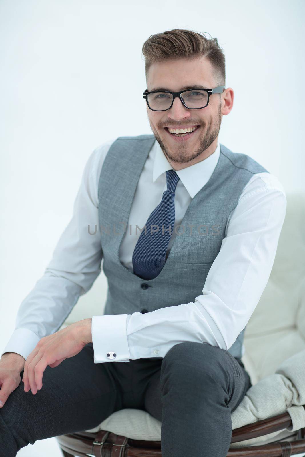 close up.confident man sitting in a comfortable chair.photo with copy space