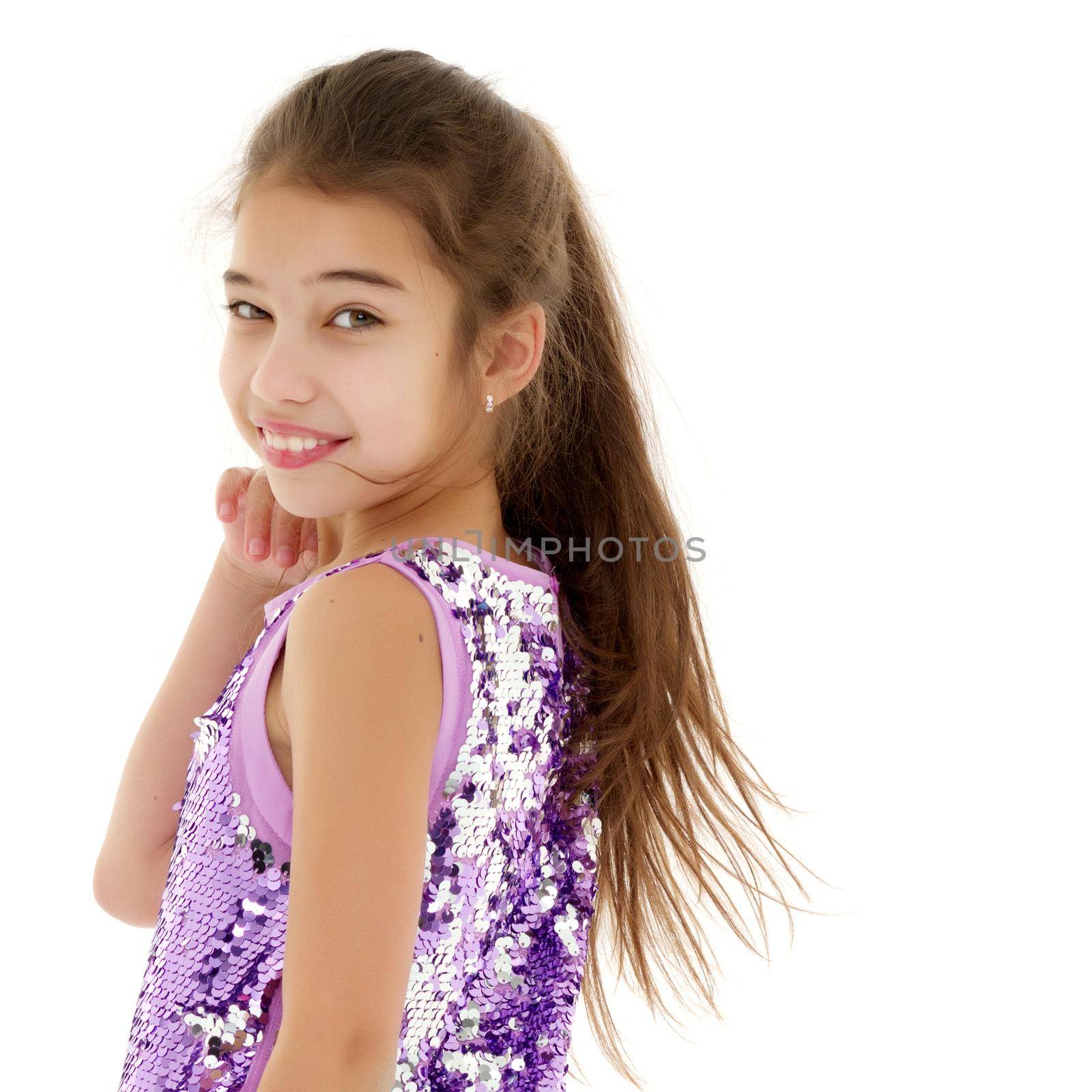 Beautiful little girl close-up. The concept of beauty and fashion, happy childhood. Isolated on white background.