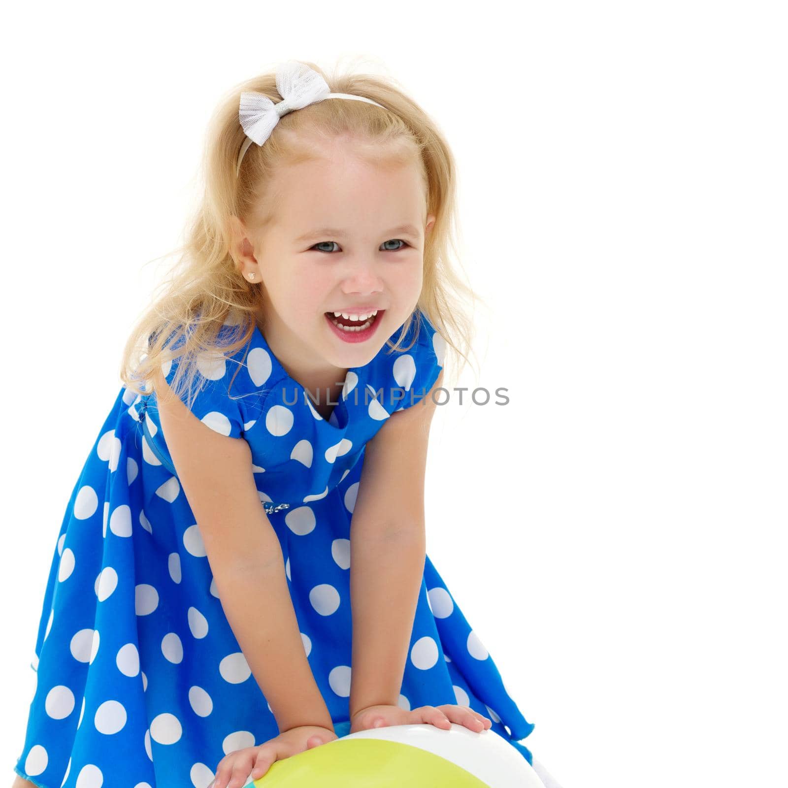 Beautiful little girl laughing. The concept of a happy childhood, emotions. Isolated on white background.