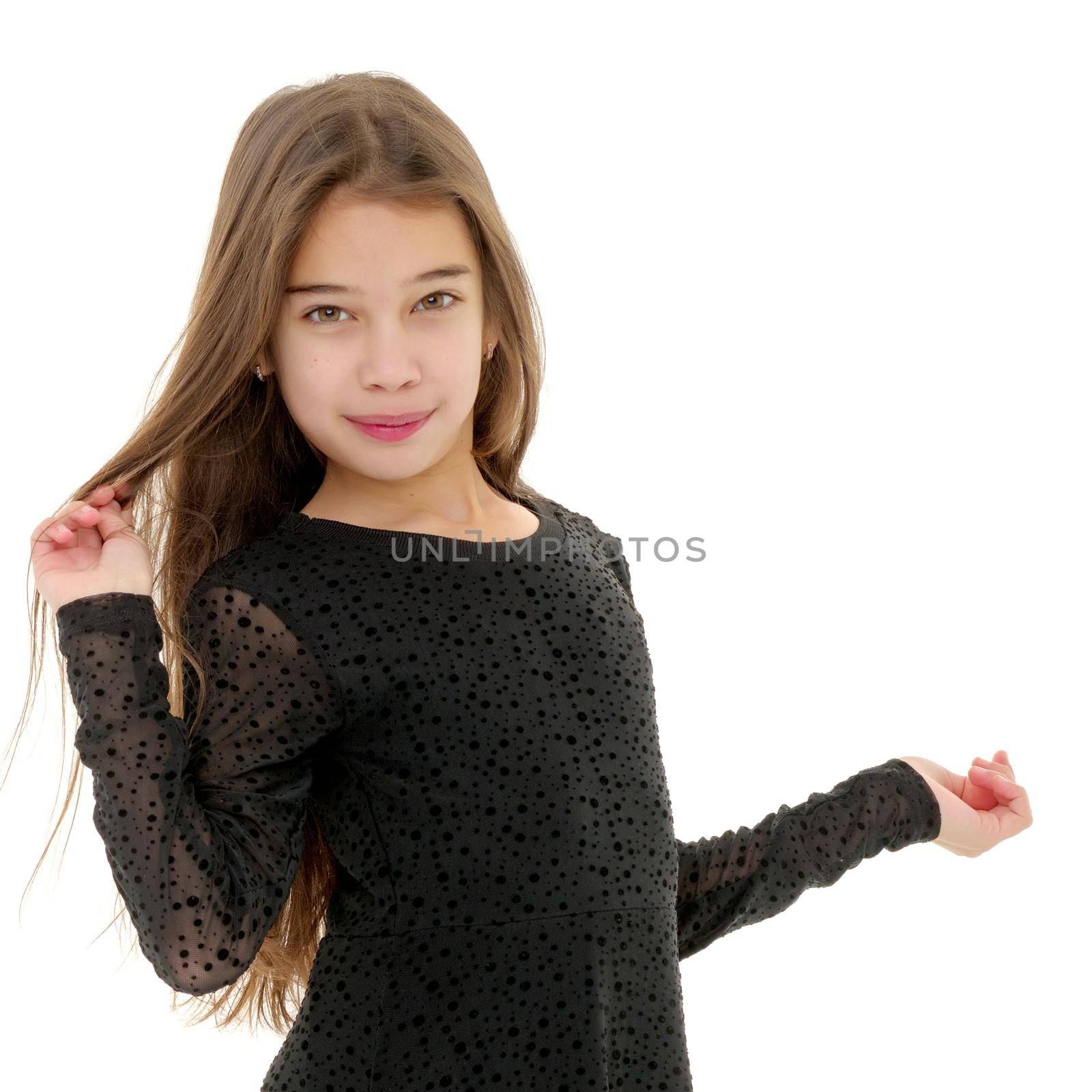 Beautiful little girl close-up. The concept of beauty and fashion, happy childhood. Isolated on white background.