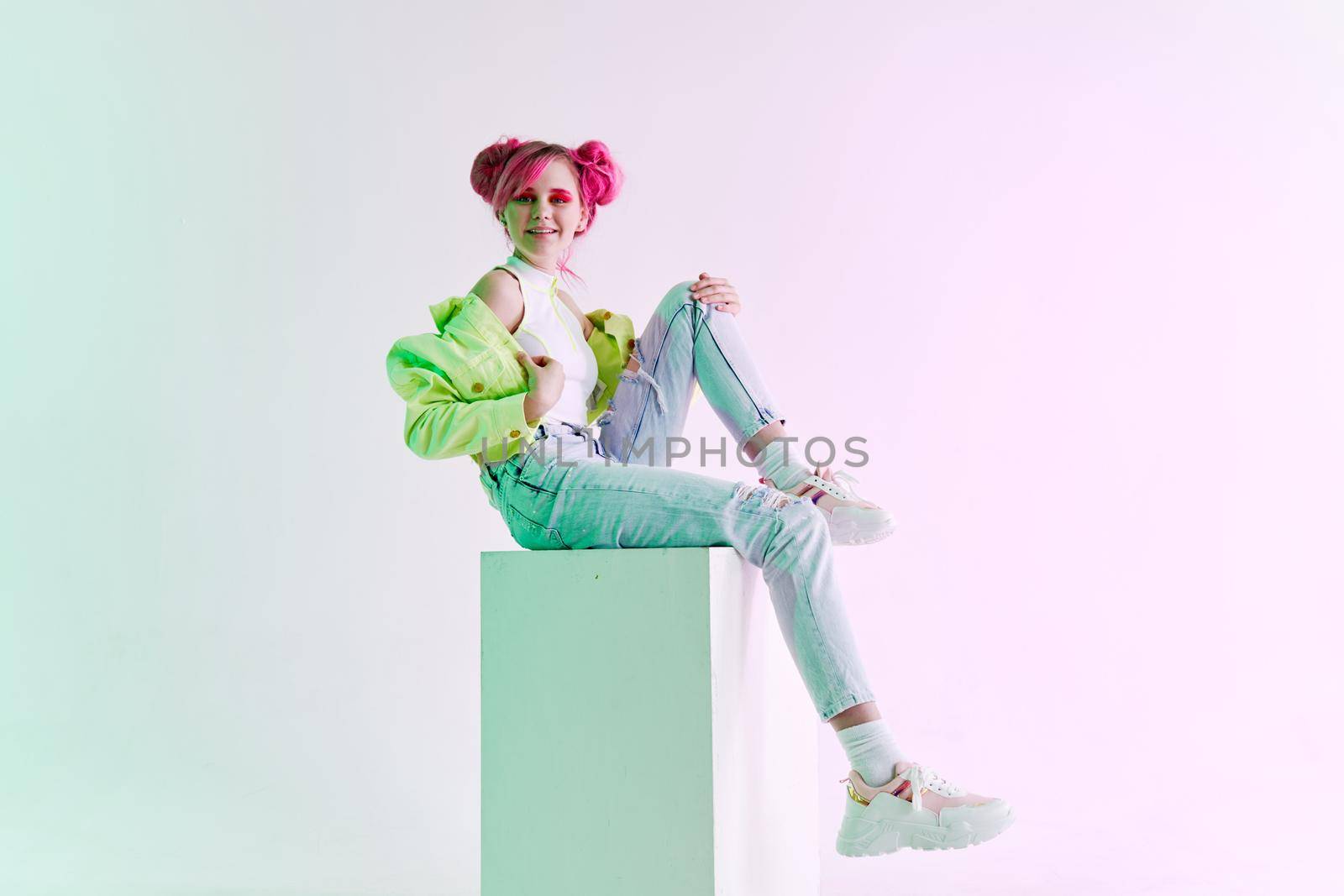 cheerful woman bright cosmetics party posing neon background. High quality photo