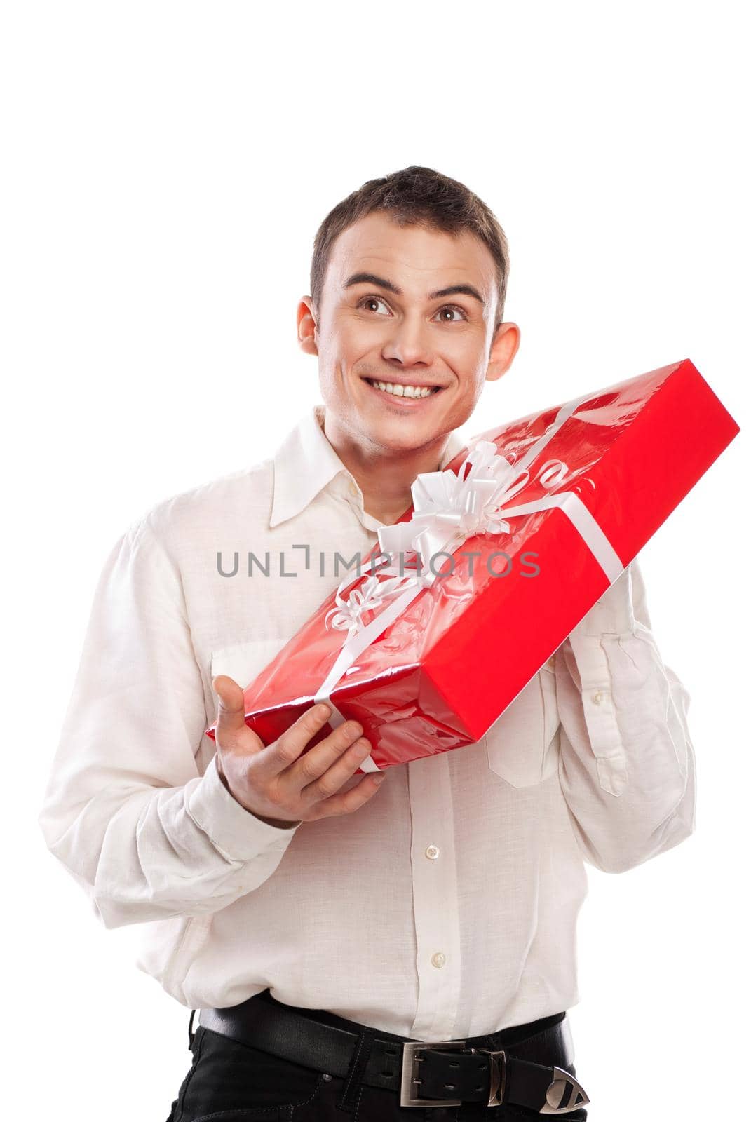 smiling man holding gift isolated on white by Julenochek