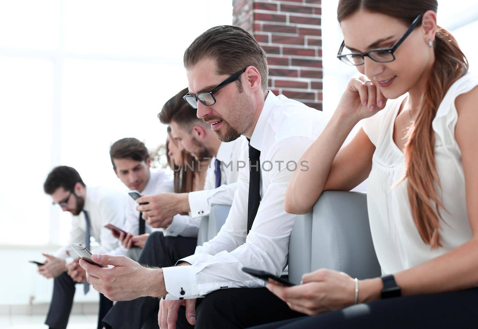 young woman sitting in line for an interview.people and technology