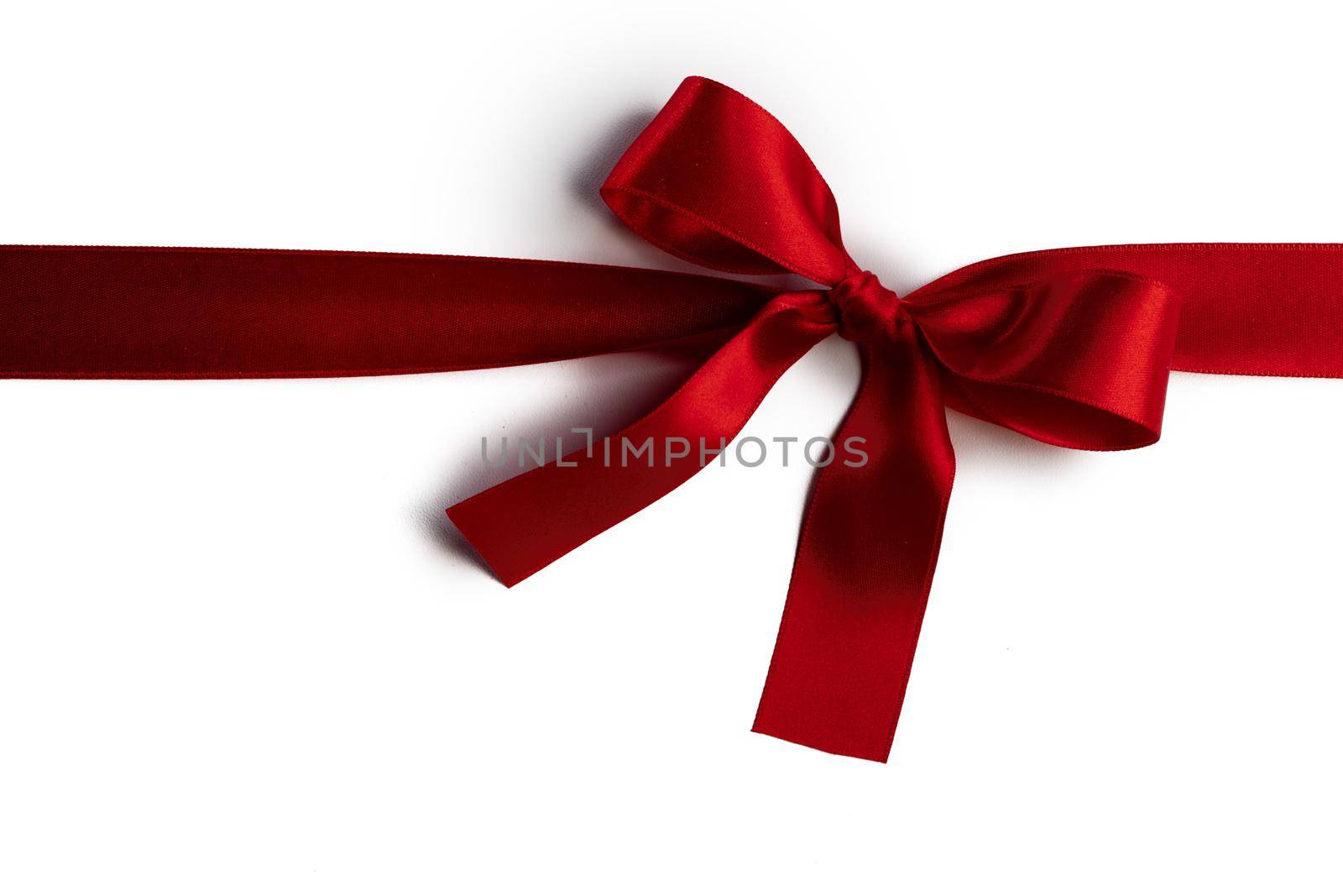 Red bow isolated on white background, birthday Valentine day Christmas decoration design element