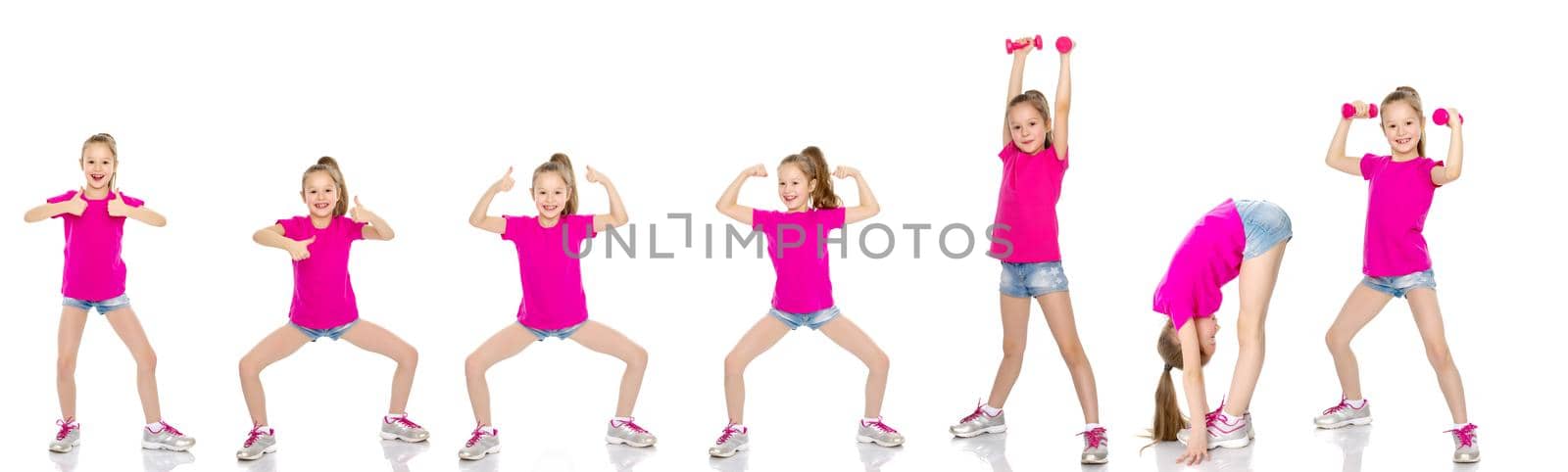 Beautiful little girl shows her muscles. The concept of strength, health and sport. Isolated on white background.