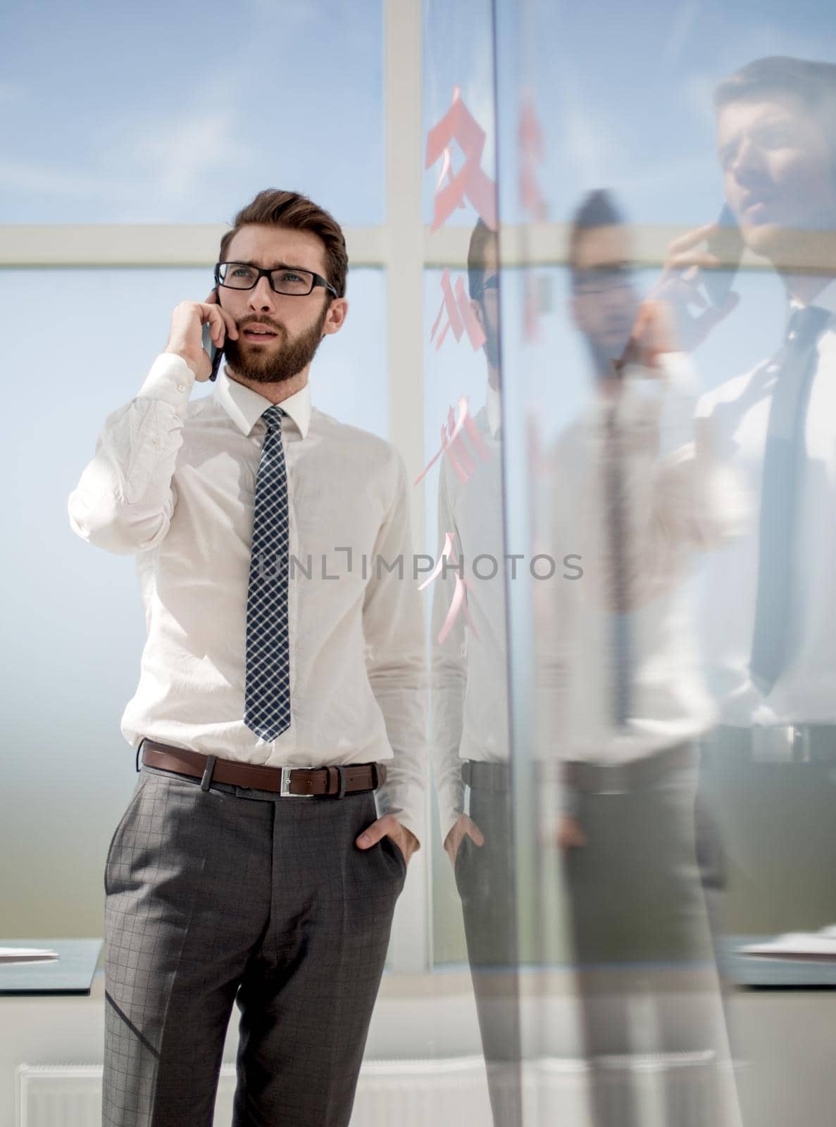 two business people standing in the office by asdf