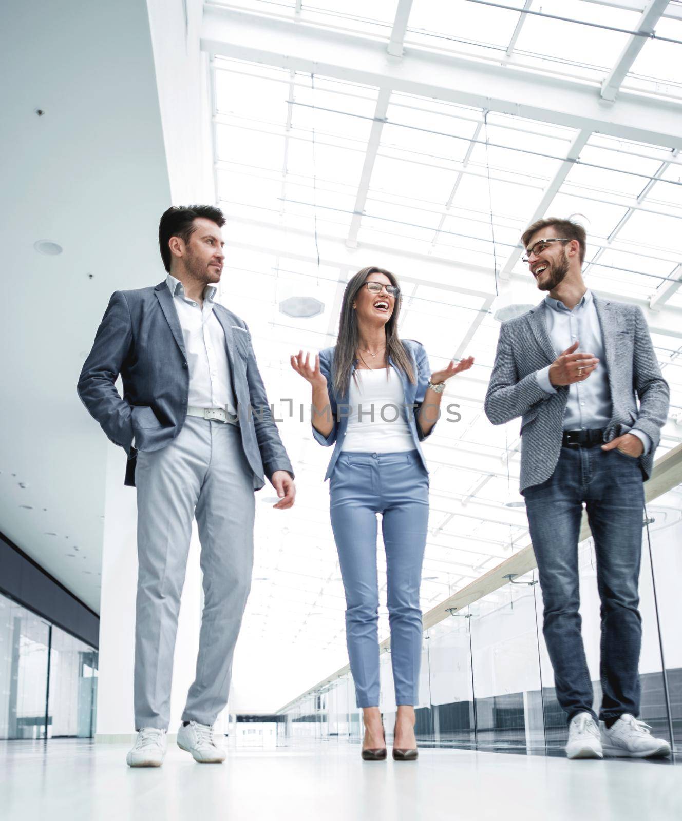 Business people walking in the office corridor.business concept