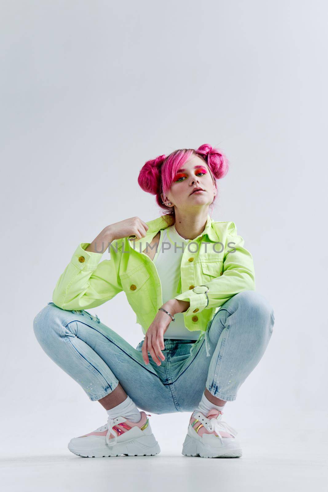 fashionable woman bright cosmetics party posing Acid style design. High quality photo