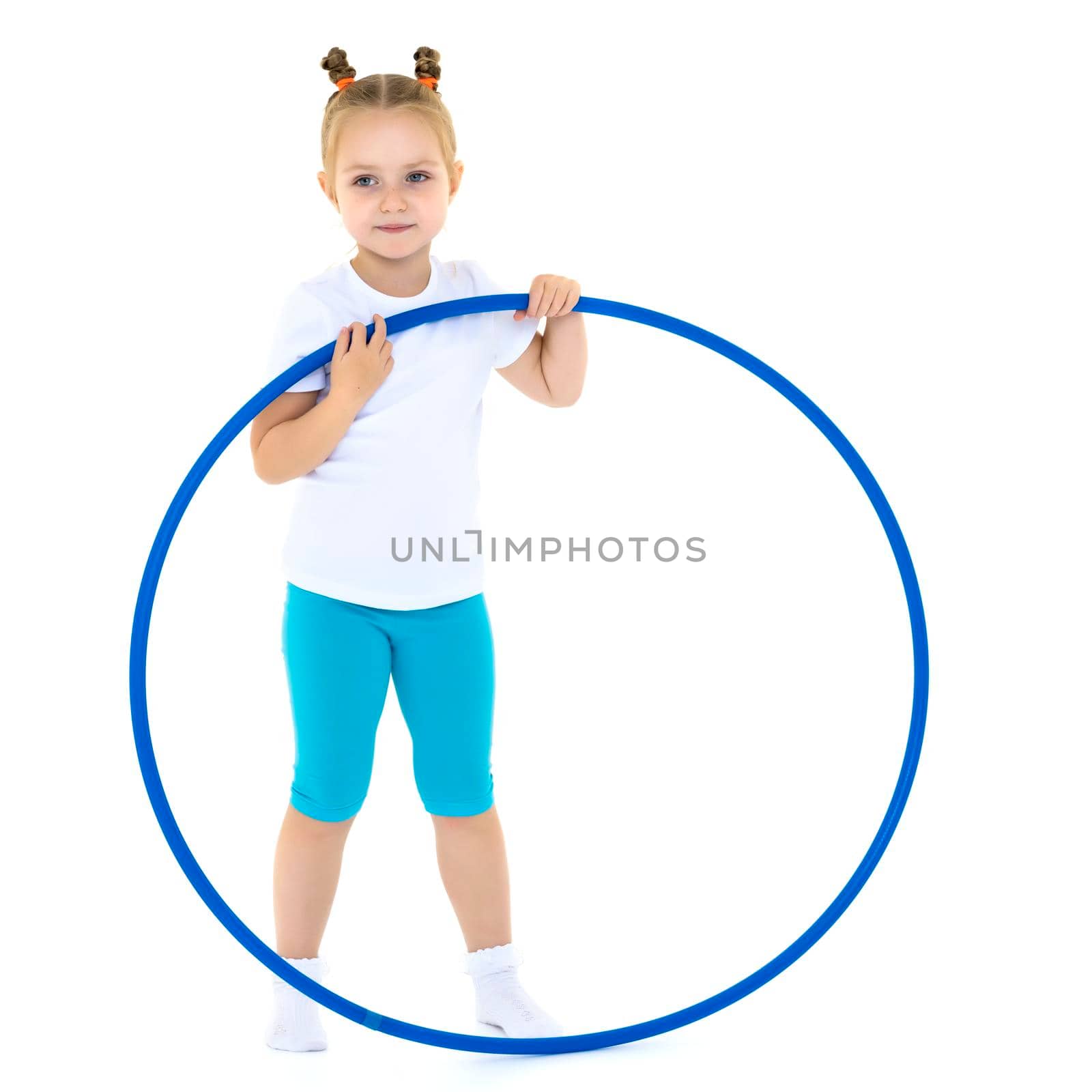 The little girl turns the hoop. by kolesnikov_studio