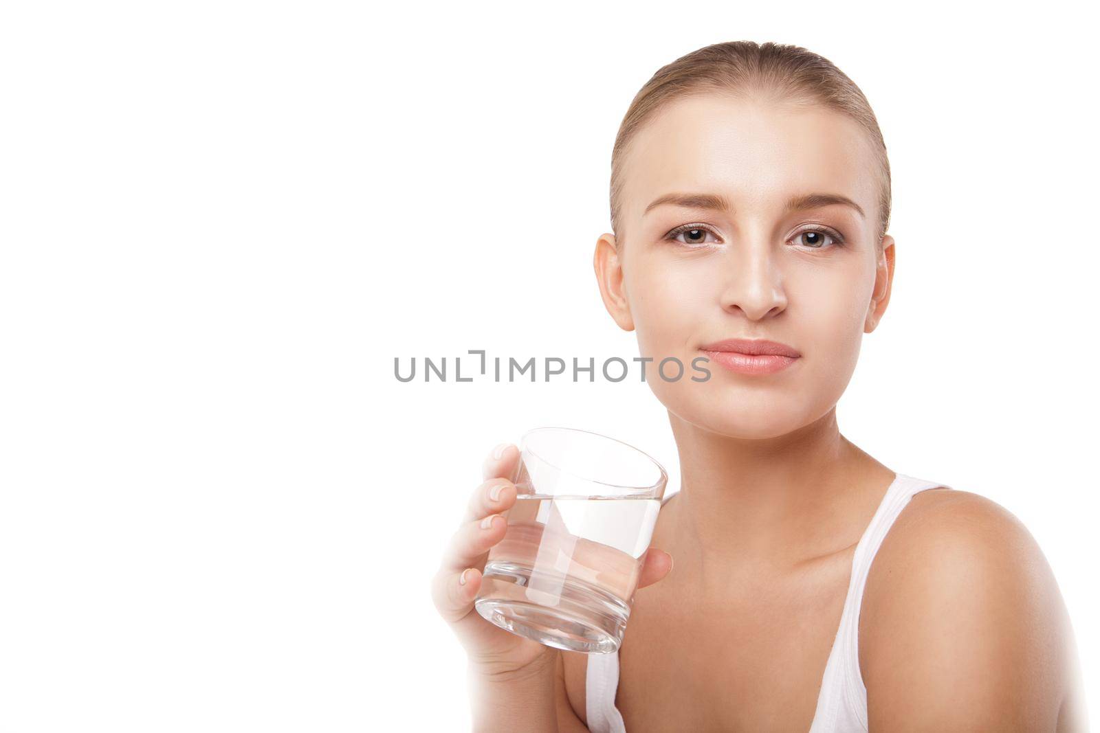 Girl drinking water from glass isolated by Julenochek