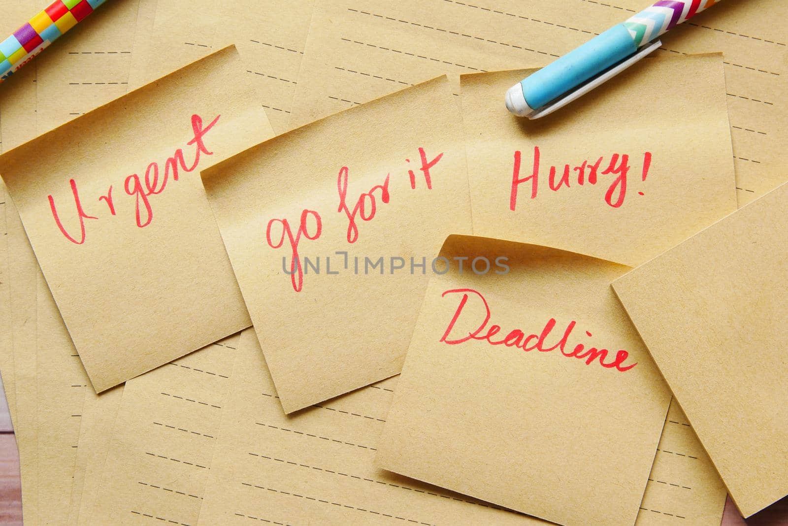close up of deadline word word on a stick note paper