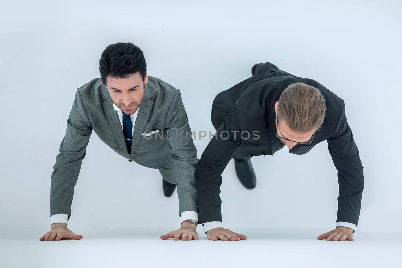 two businessmen at the starting position. competition concept
