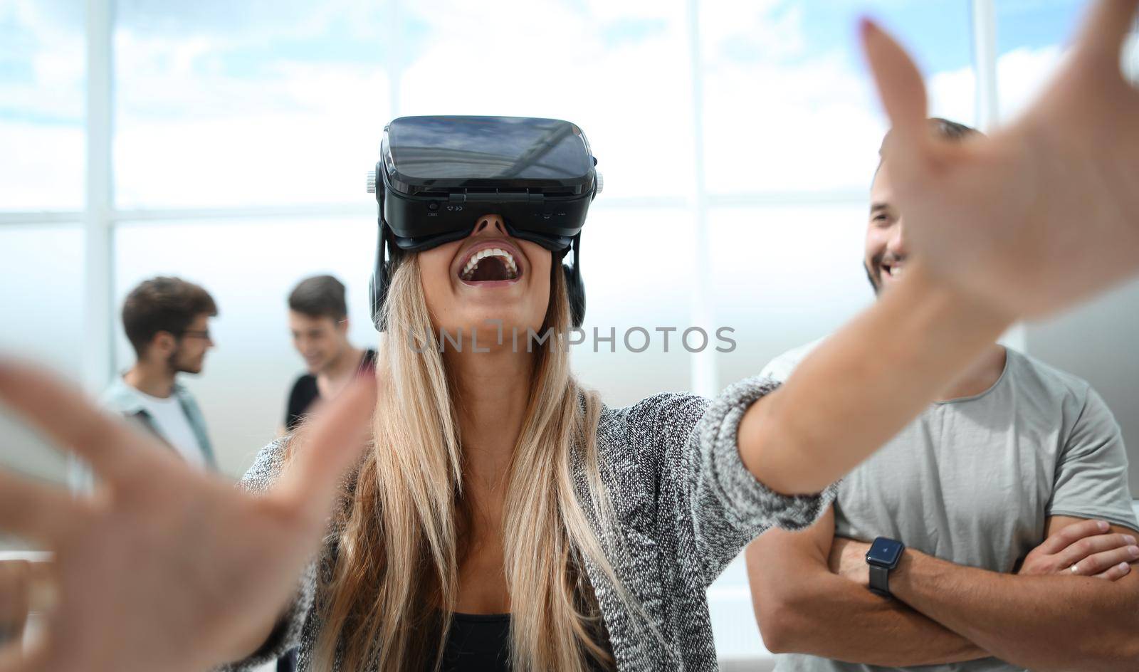 Young girl in virtual augmented reality helmet