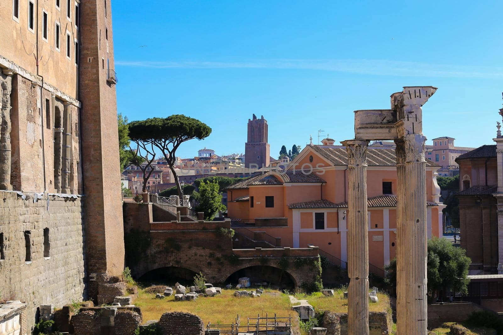 Antique columns and ruins in Rome, Italy. Conceptof Roman Forum and european sightseeing, summer vacations in Europe.