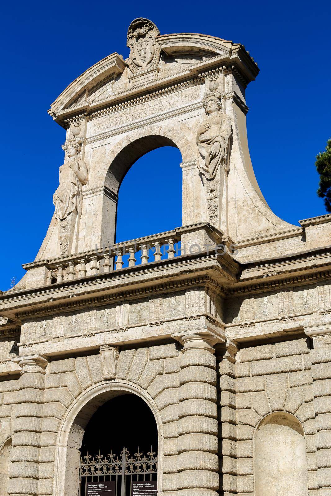 Old arch with sculpture in Rome, Italy. by sisterspro