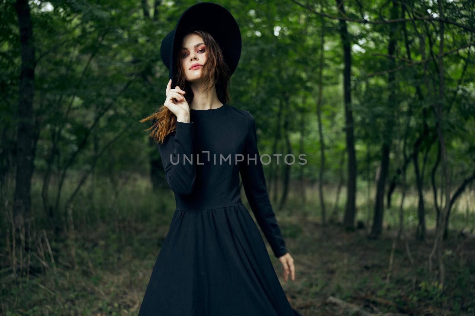 cheerful woman witch in the forest posing fantasy by Vichizh