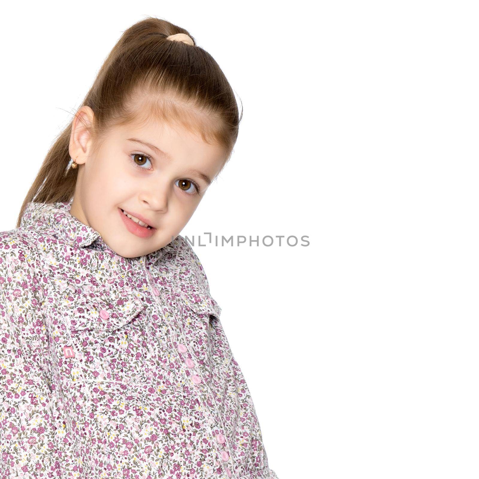 Beautiful little girl close-up. The concept of beauty and fashion, happy childhood. Isolated on white background.