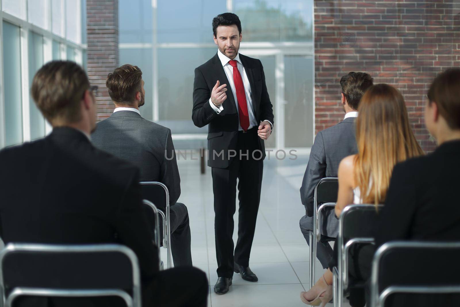 businessman makes a report for the business team.business and education